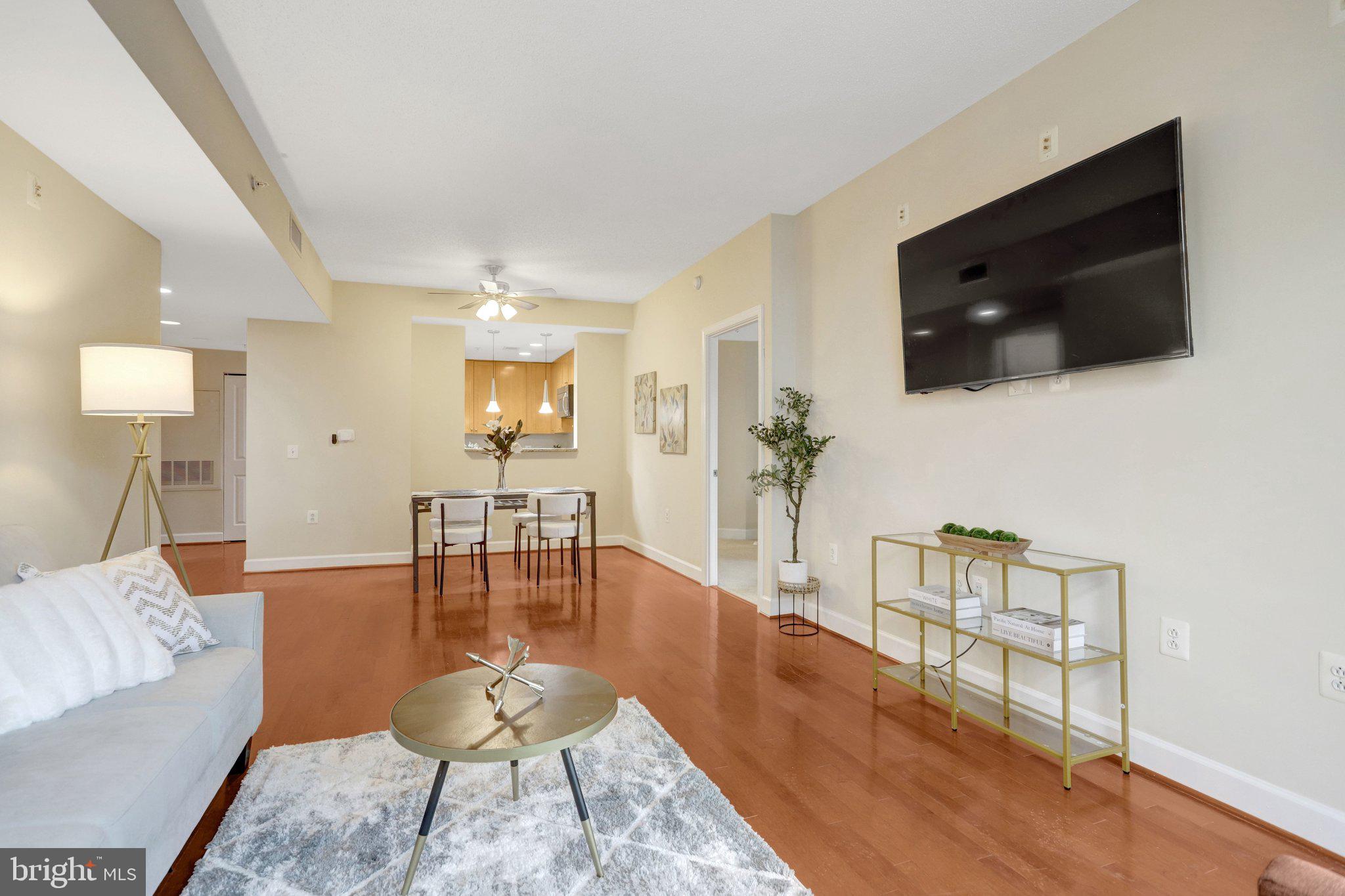 3650 South Glebe Road, Unit 442 Arlington, VA 22202 - Photo 15 of 54 a living room with furniture and a flat screen tv