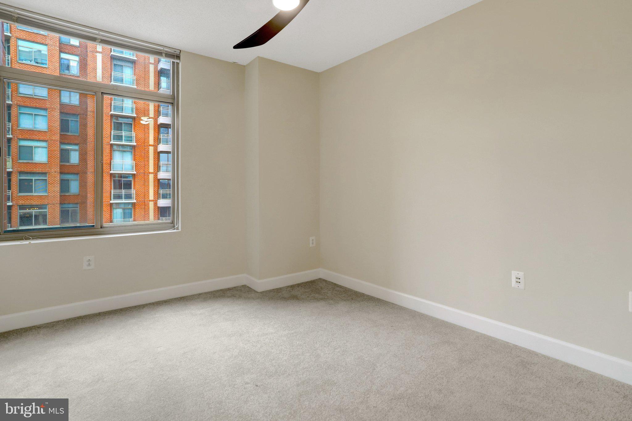 3650 South Glebe Road, Unit 442 Arlington, VA 22202 - Photo 24 of 54 a view of an empty room with a window