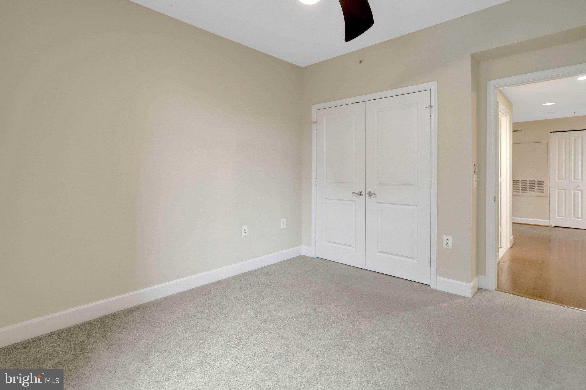 3650 South Glebe Road, Unit 442 Arlington, VA 22202 - Photo 25 of 54 an empty room with windows and closet