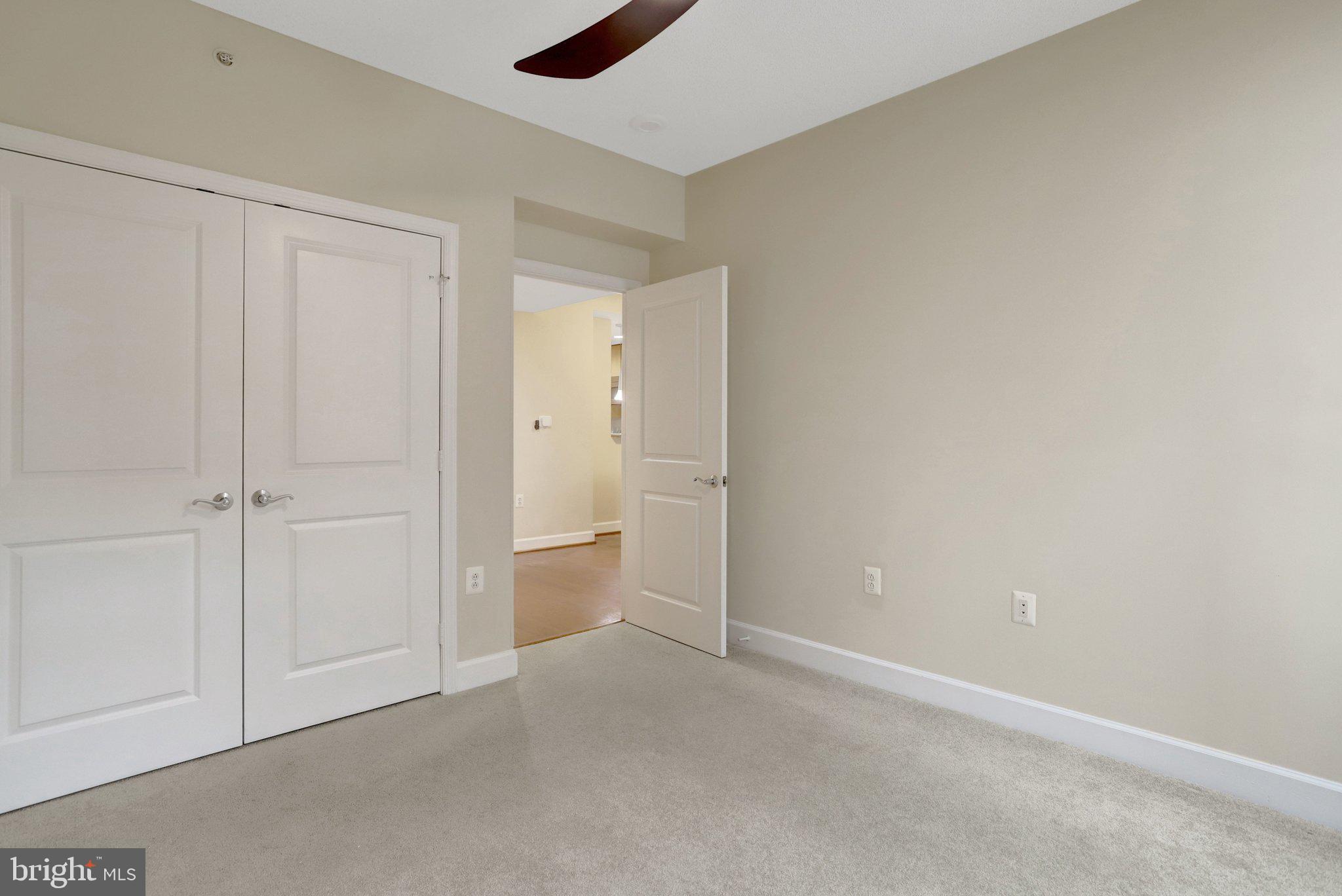 3650 South Glebe Road, Unit 442 Arlington, VA 22202 - Photo 26 of 54 a view of an empty room and closet area