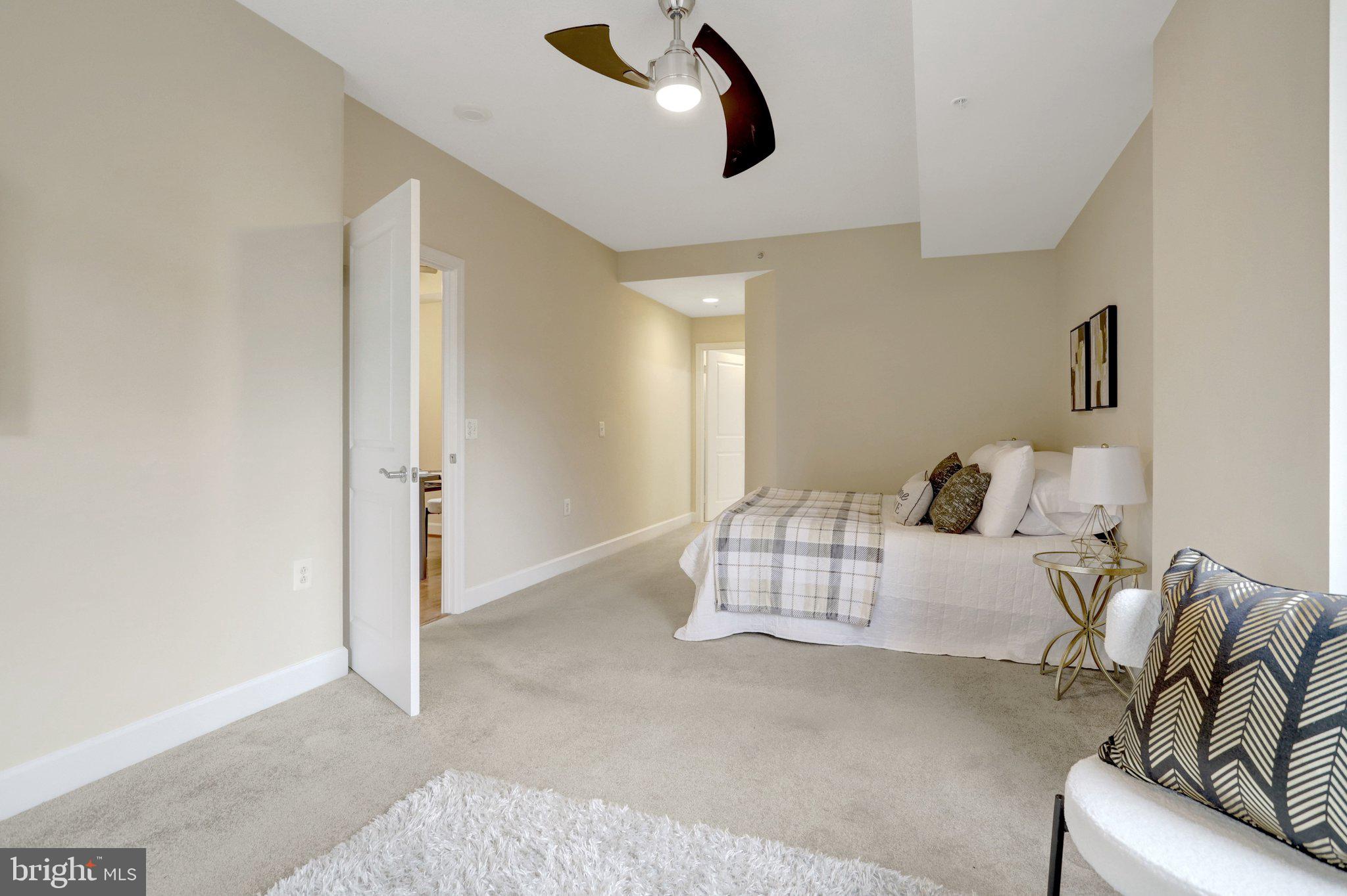 3650 South Glebe Road, Unit 442 Arlington, VA 22202 - Photo 30 of 54 a bedroom with furniture and a ceiling fan