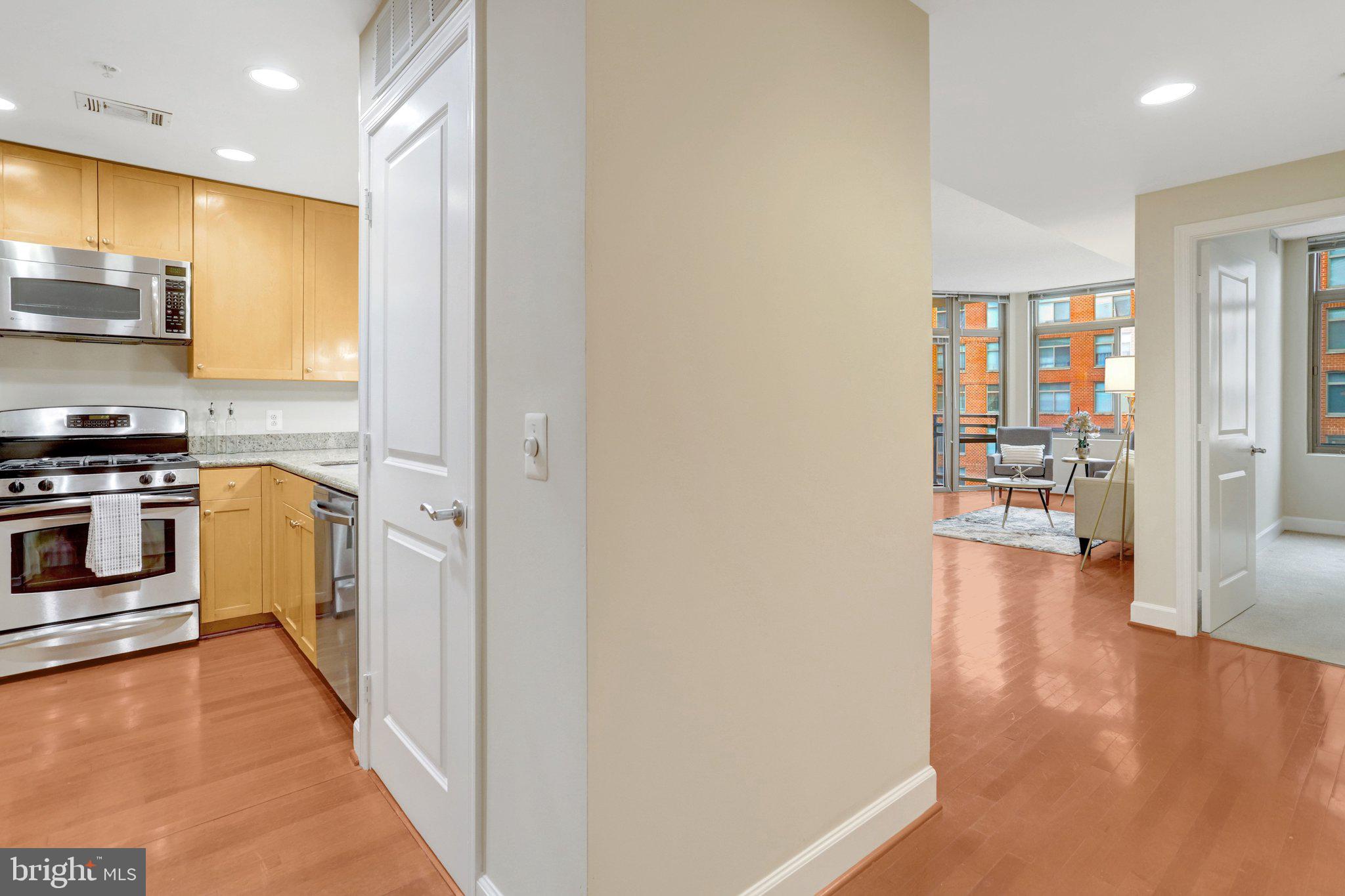 3650 South Glebe Road, Unit 442 Arlington, VA 22202 - Photo 7 of 54 a view of a kitchen cabinets and wooden floor