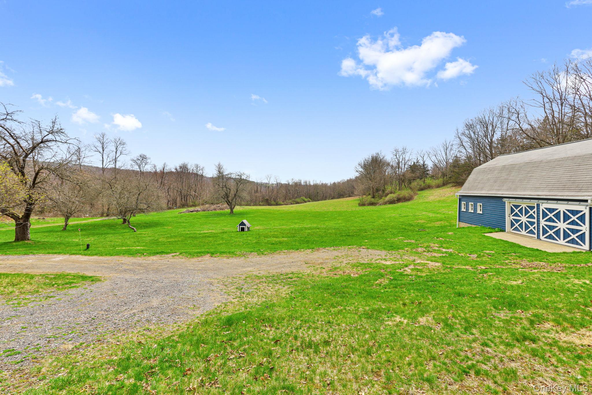 770 Gahbauer Road Hudson, NY 12534 - Photo 28 of 39 a view of a golf course with a big yard