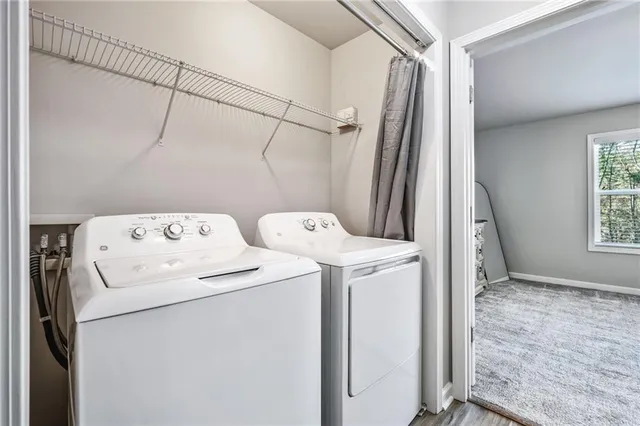 a utility room with dryer and washer