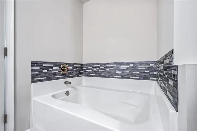 a bathroom with a bathtub