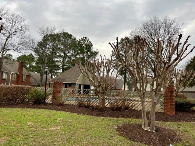 1833 Allenby Green, Unit 1833 Germantown, TN 38139 - Photo 16 of 18 a front view of a house with garden