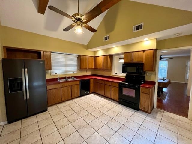 1833 Allenby Green, Unit 1833 Germantown, TN 38139 - Photo 3 of 18 a kitchen with stainless steel appliances kitchen island granite countertop a refrigerator and a stove
