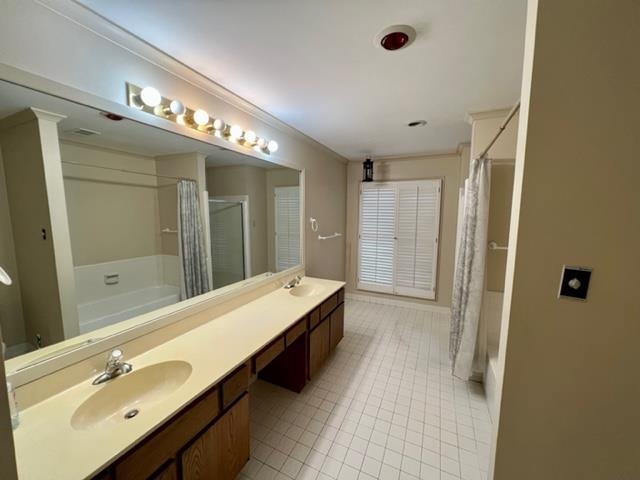 1833 Allenby Green, Unit 1833 Germantown, TN 38139 - Photo 9 of 18 a spacious bathroom with a double vanity sink a large mirror and shower