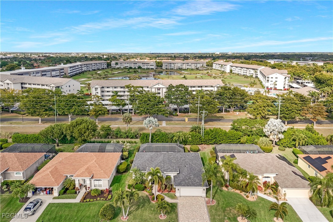 15047 Balmoral Loop Fort Myers, FL 33919 - Photo 34 of 37 an aerial view of residential building and lake view