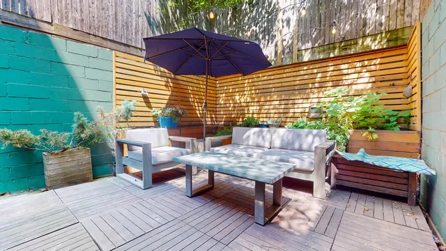 a bathroom with a sink a toilet and a shower