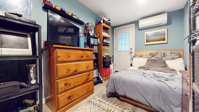 a dining room with furniture and a chandelier