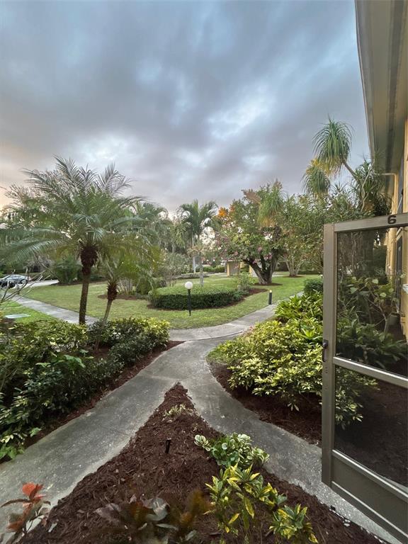 2155 Wood Street, Unit A6 Sarasota, FL 34237 - Photo 5 of 7 a view of a yard with an outdoor space