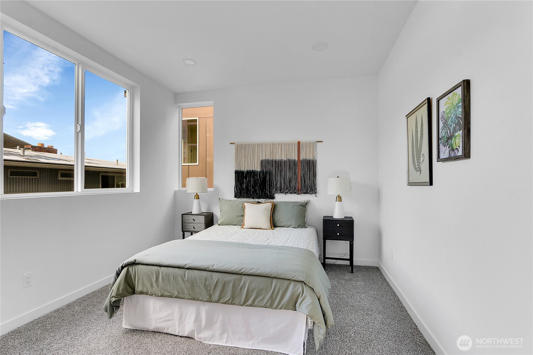 631 West Emerson Street Seattle, WA 98119 - Photo 12 of 24 a bedroom with a bed and lamp