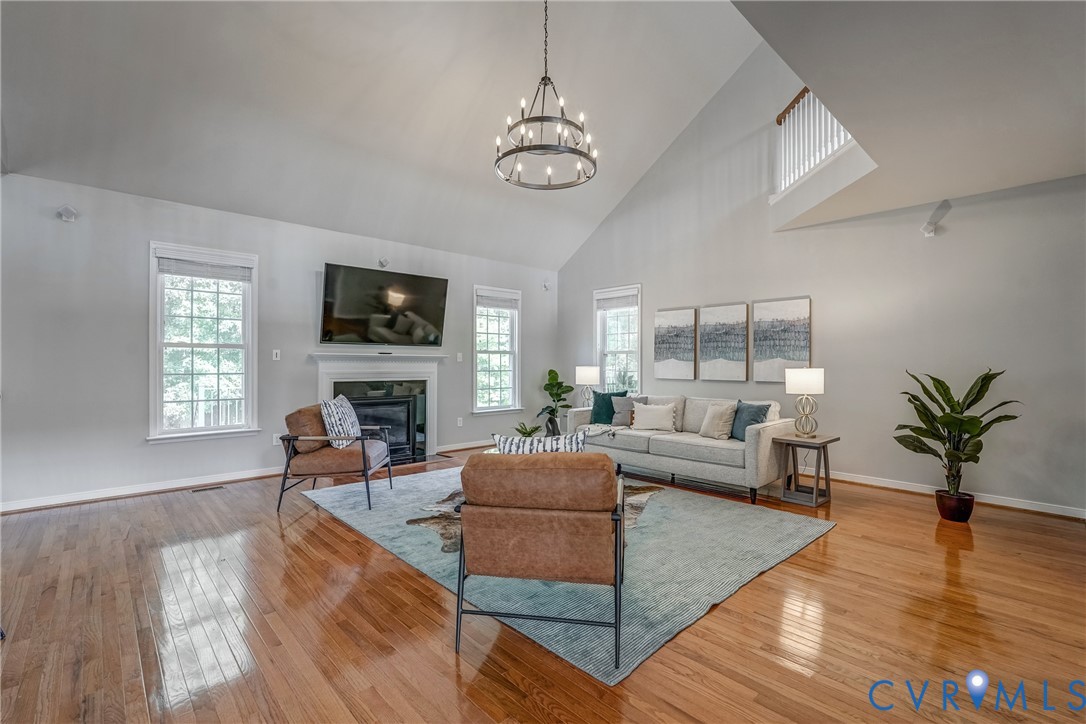 3612 Edenfield Road Midlothian, VA 23113 - Photo 21 of 50 a living room with furniture a fireplace and a flat screen tv
