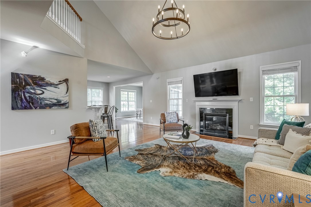 3612 Edenfield Road Midlothian, VA 23113 - Photo 23 of 50 a living room with furniture a fireplace and a flat screen tv