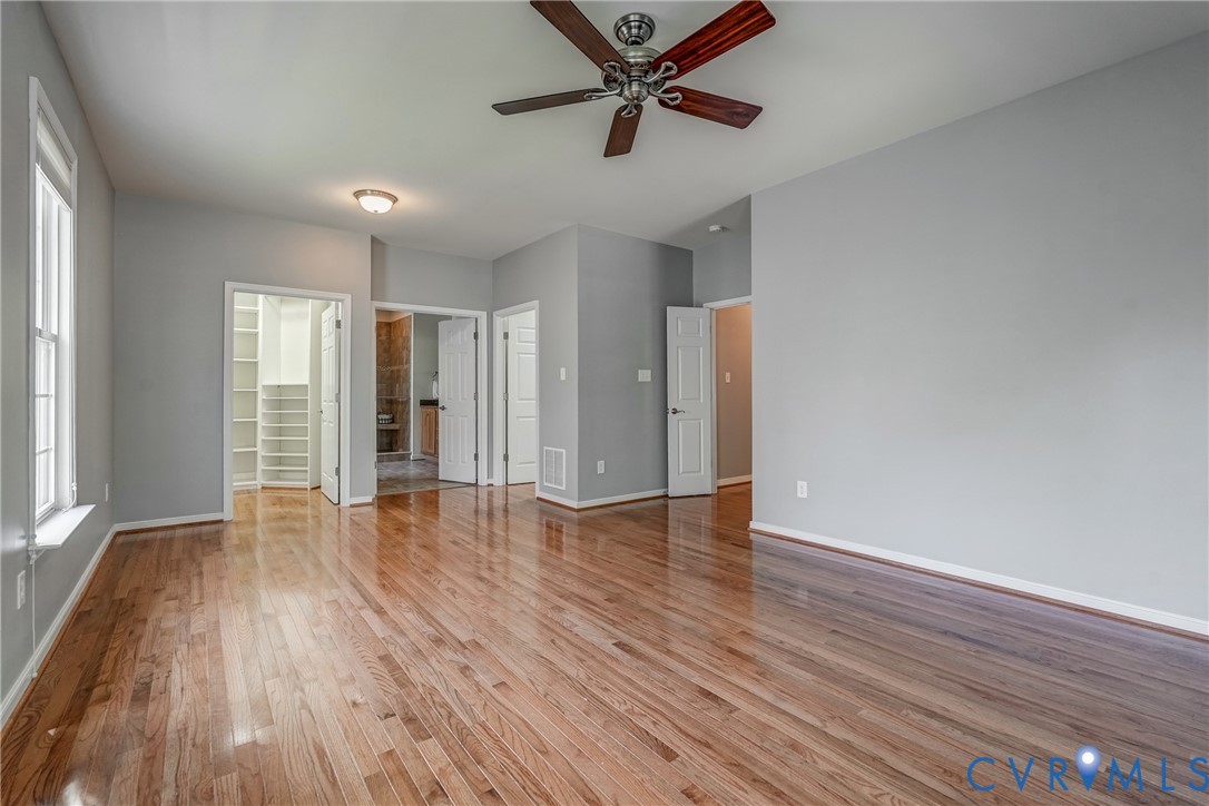 3612 Edenfield Road Midlothian, VA 23113 - Photo 25 of 50 a view of an empty room with wooden floor and a window