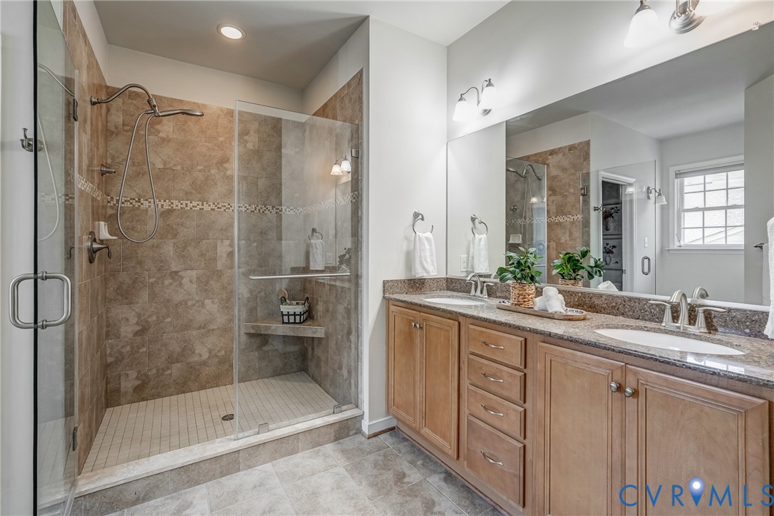 3612 Edenfield Road Midlothian, VA 23113 - Photo 29 of 50 a bathroom with a shower sink and mirror