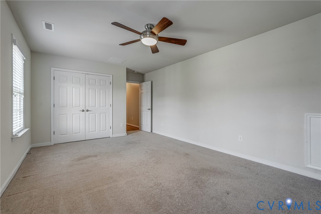 3612 Edenfield Road Midlothian, VA 23113 - Photo 36 of 50 an empty room with window and ceiling fan