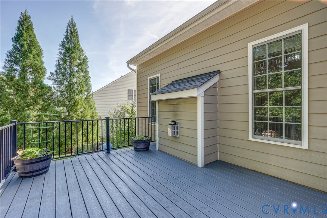 3612 Edenfield Road Midlothian, VA 23113 - Photo 45 of 50 a view of a deck with a large window and wooden floor