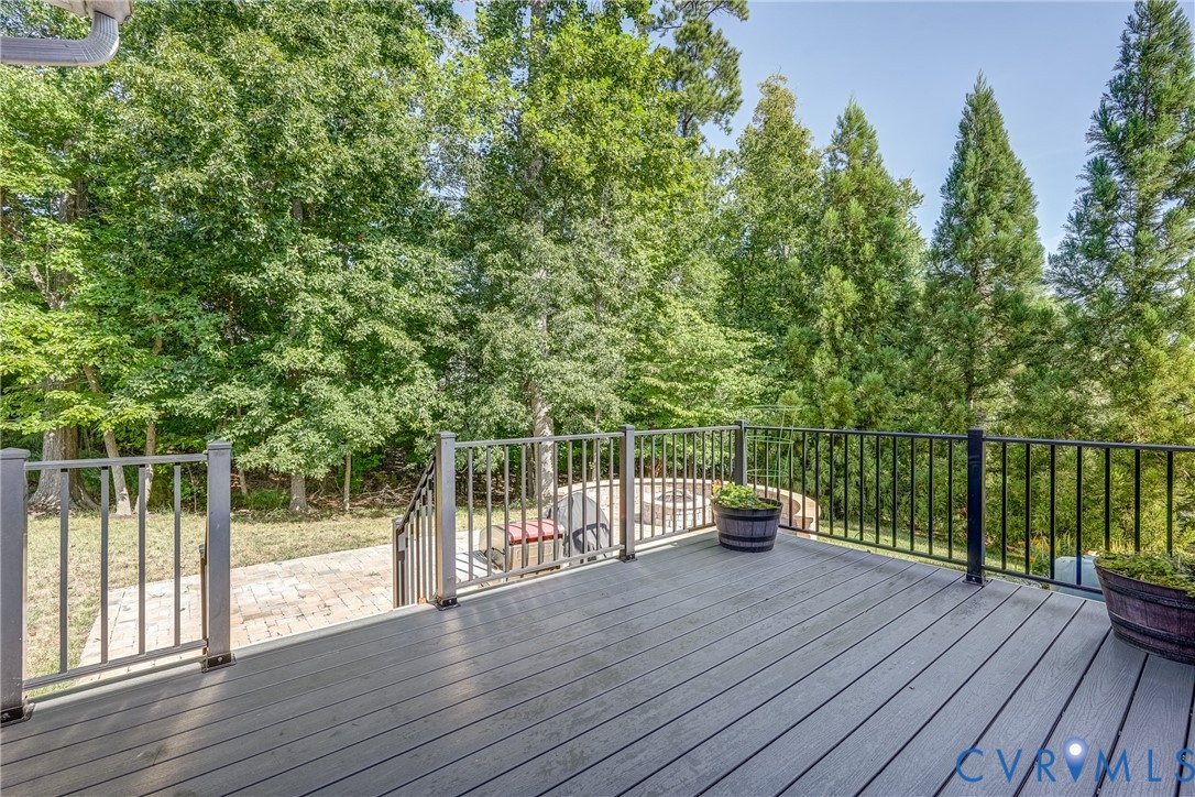 3612 Edenfield Road Midlothian, VA 23113 - Photo 46 of 50 a view of a deck with two chair and wooden floor