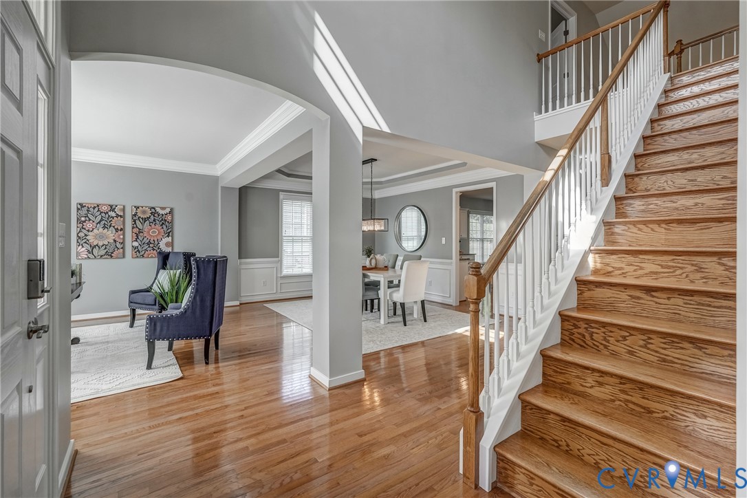 3612 Edenfield Road Midlothian, VA 23113 - Photo 5 of 50 a view of staircase with wooden floor and a rug