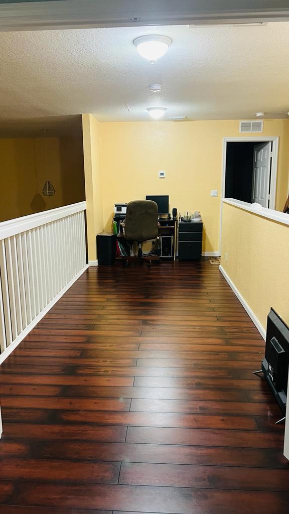1267 Rose Gate Boulevard Riviera Beach, FL 33404 - Photo 20 of 29 a living room with furniture and a flat screen tv