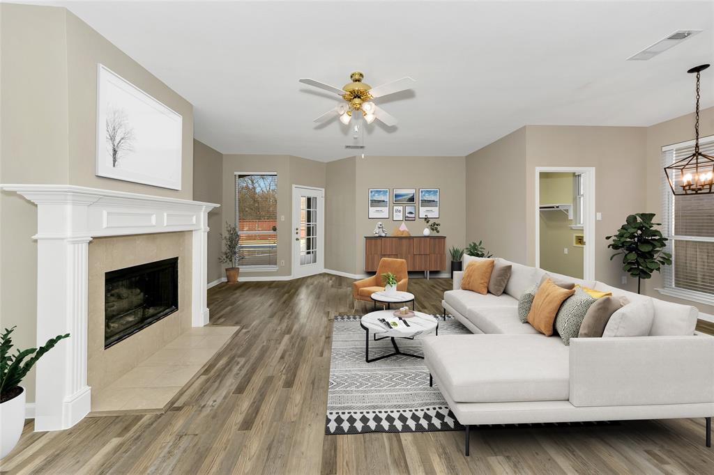 857 Summit Pointe Lewisville, TX 75077 - Photo 12 of 33 a living room with furniture and a fireplace