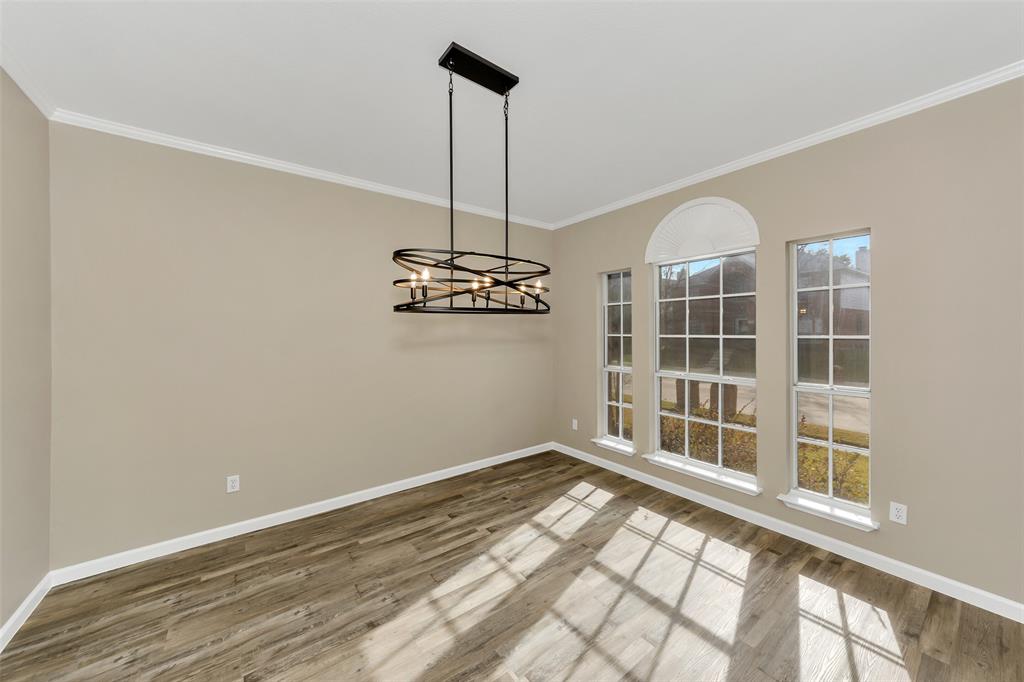 857 Summit Pointe Lewisville, TX 75077 - Photo 14 of 33 a view of an empty room with windows