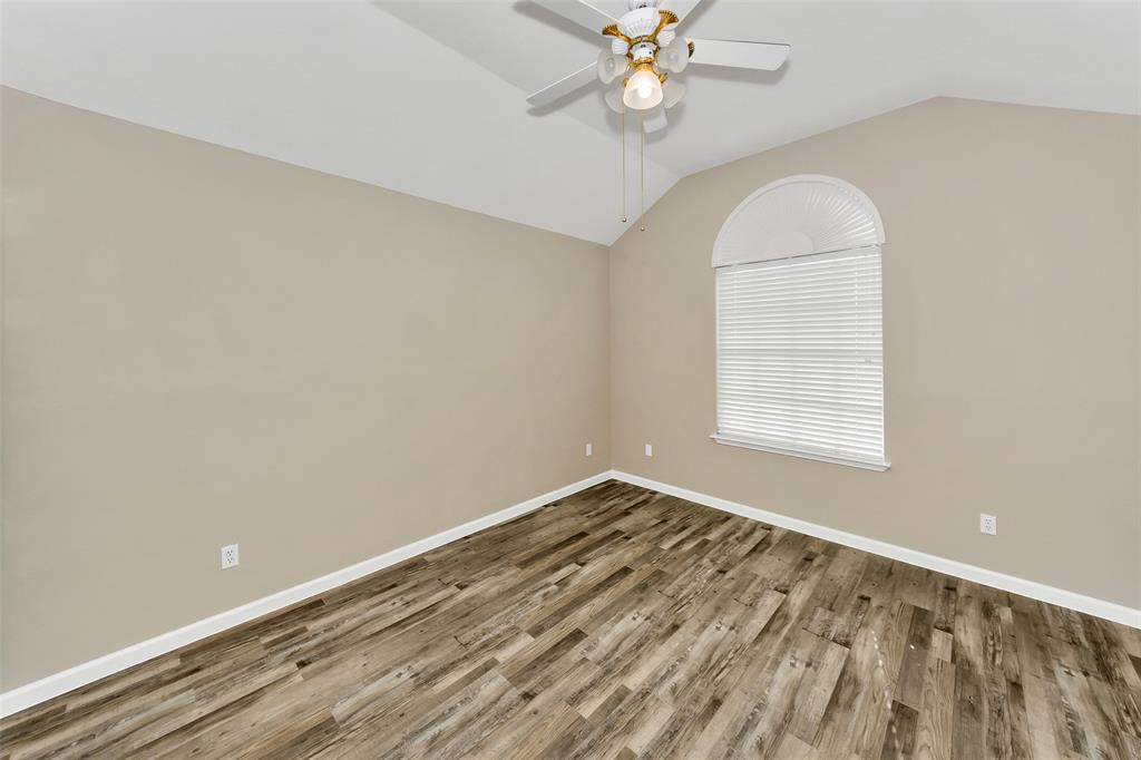 857 Summit Pointe Lewisville, TX 75077 - Photo 24 of 33 an empty room with a window