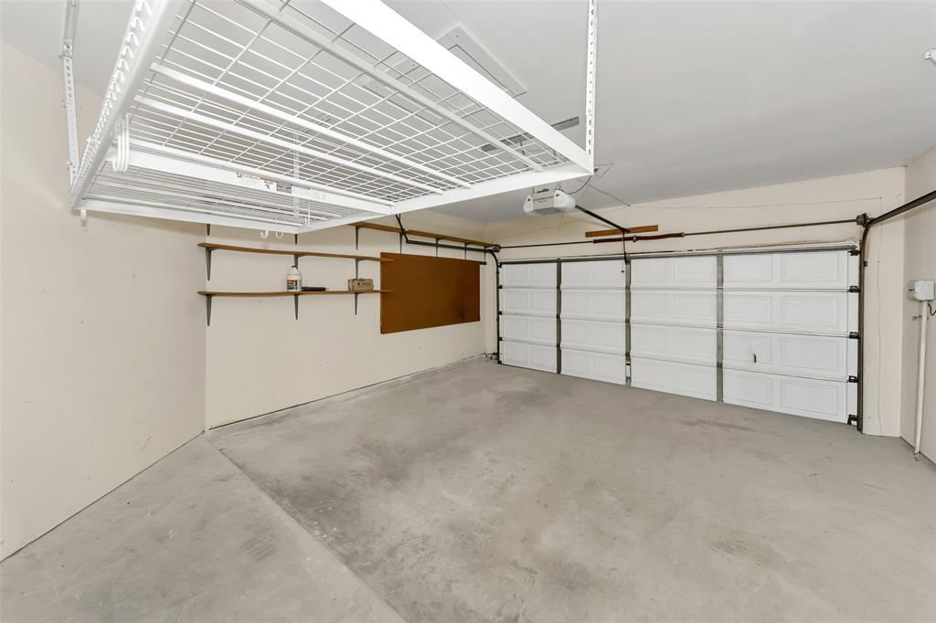 857 Summit Pointe Lewisville, TX 75077 - Photo 28 of 33 a view of a garage