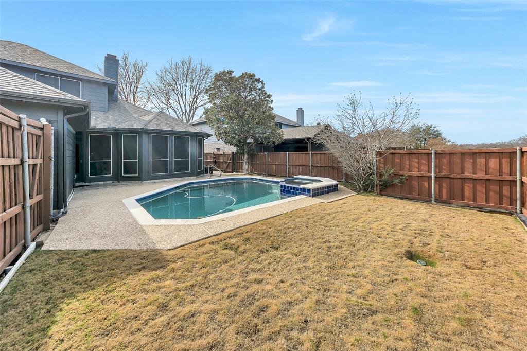 857 Summit Pointe Lewisville, TX 75077 - Photo 32 of 33 a view of outdoor space yard and swimming pool