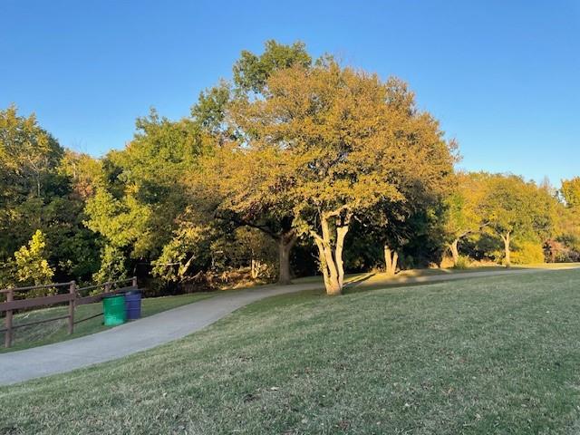 857 Summit Pointe Lewisville, TX 75077 - Photo 4 of 33 a view of a field of grass and trees