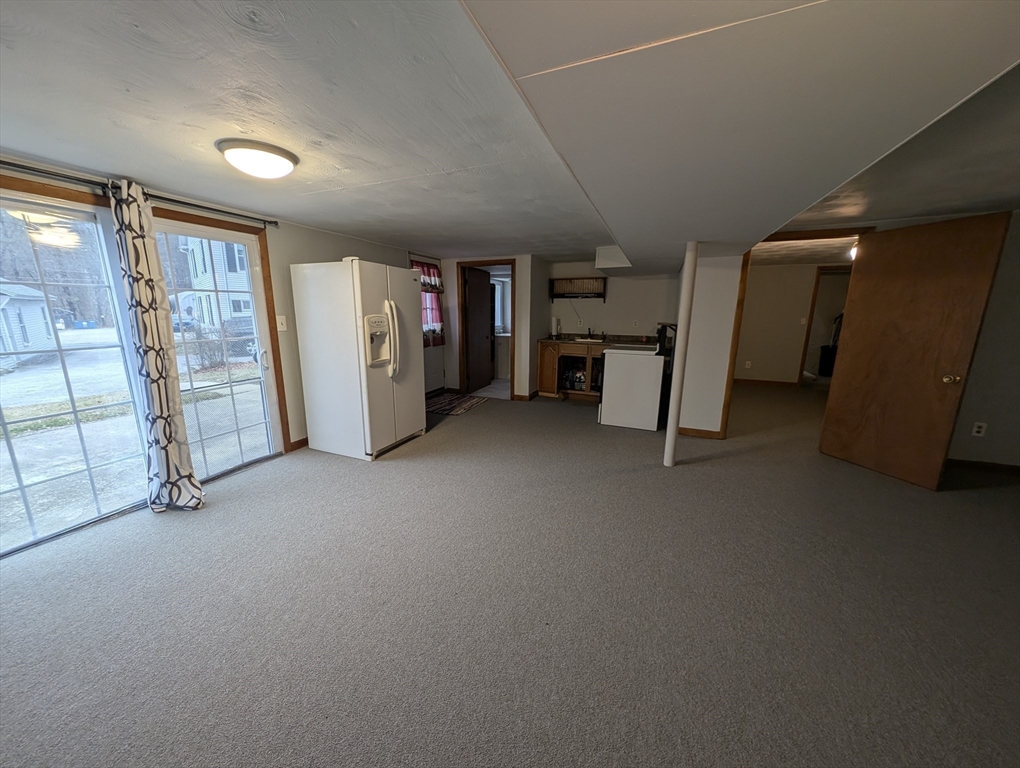 13 Brookfield Road Charlton, MA 01507 - Photo 12 of 41 an empty room with furniture and a ceiling fan