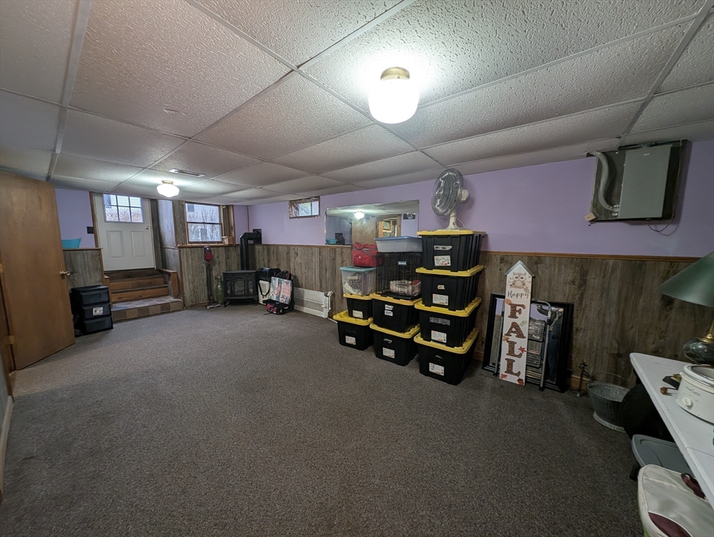 13 Brookfield Road Charlton, MA 01507 - Photo 16 of 41 a area with furniture and a fireplace