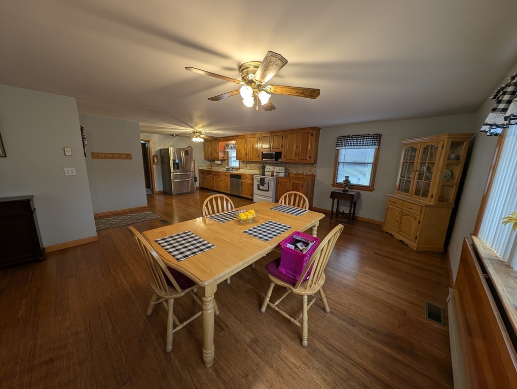 13 Brookfield Road Charlton, MA 01507 - Photo 17 of 41 a view of a dining room with furniture and wooden floor