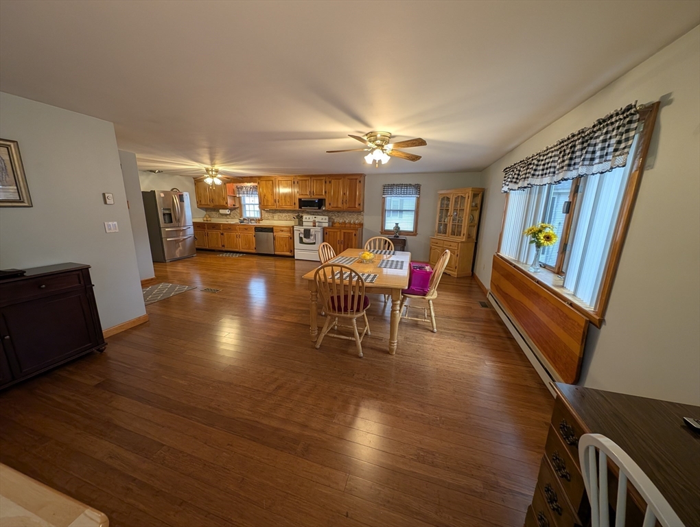 13 Brookfield Road Charlton, MA 01507 - Photo 18 of 41 a living room with furniture and a flat screen tv