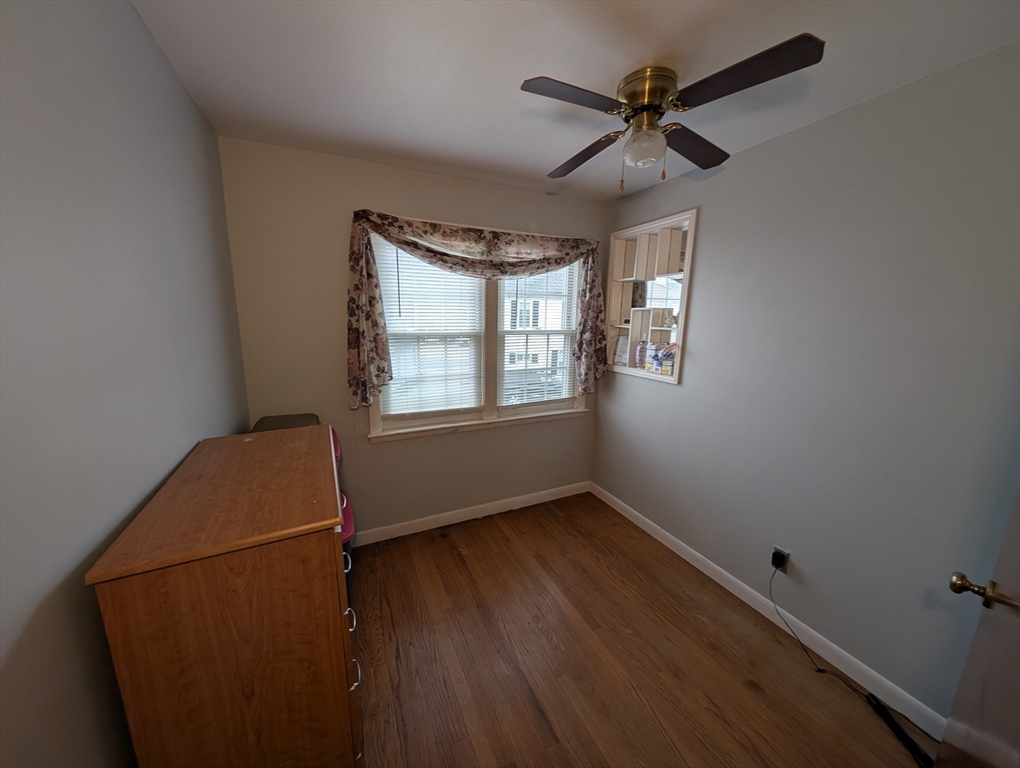 13 Brookfield Road Charlton, MA 01507 - Photo 22 of 41 wooden floor and window in an empty room