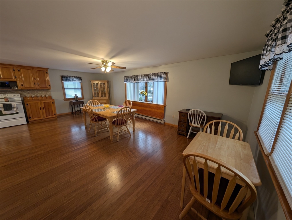 13 Brookfield Road Charlton, MA 01507 - Photo 30 of 41 a living room with furniture dining room and wooden floor