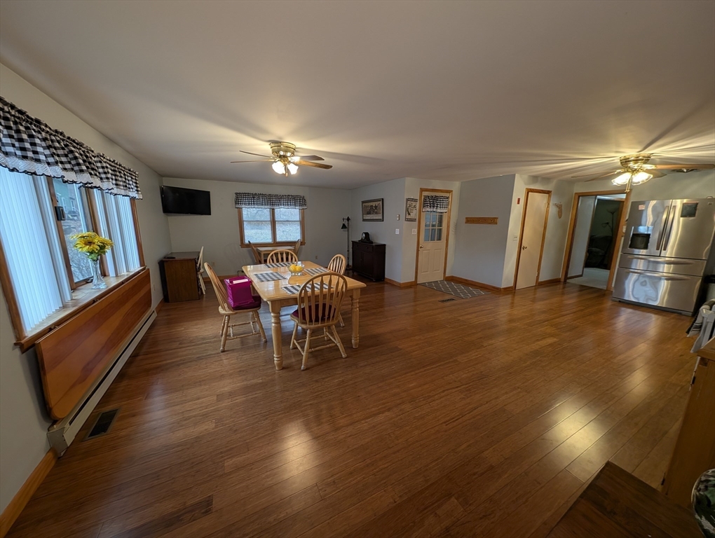13 Brookfield Road Charlton, MA 01507 - Photo 4 of 41 a living room with furniture and a wooden floor