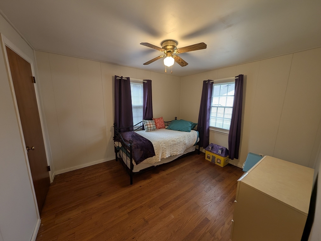 13 Brookfield Road Charlton, MA 01507 - Photo 10 of 41 a bedroom with a bed and a chandelier