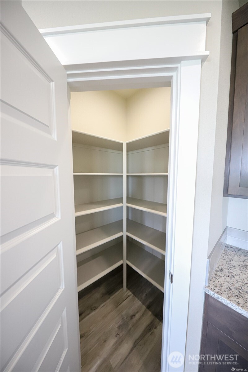 707 A Street Northeast Quincy, WA 98848 - Photo 20 of 27 a view of walk in closet with empty racks