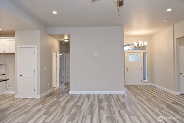 a view of a livingroom with wooden floor