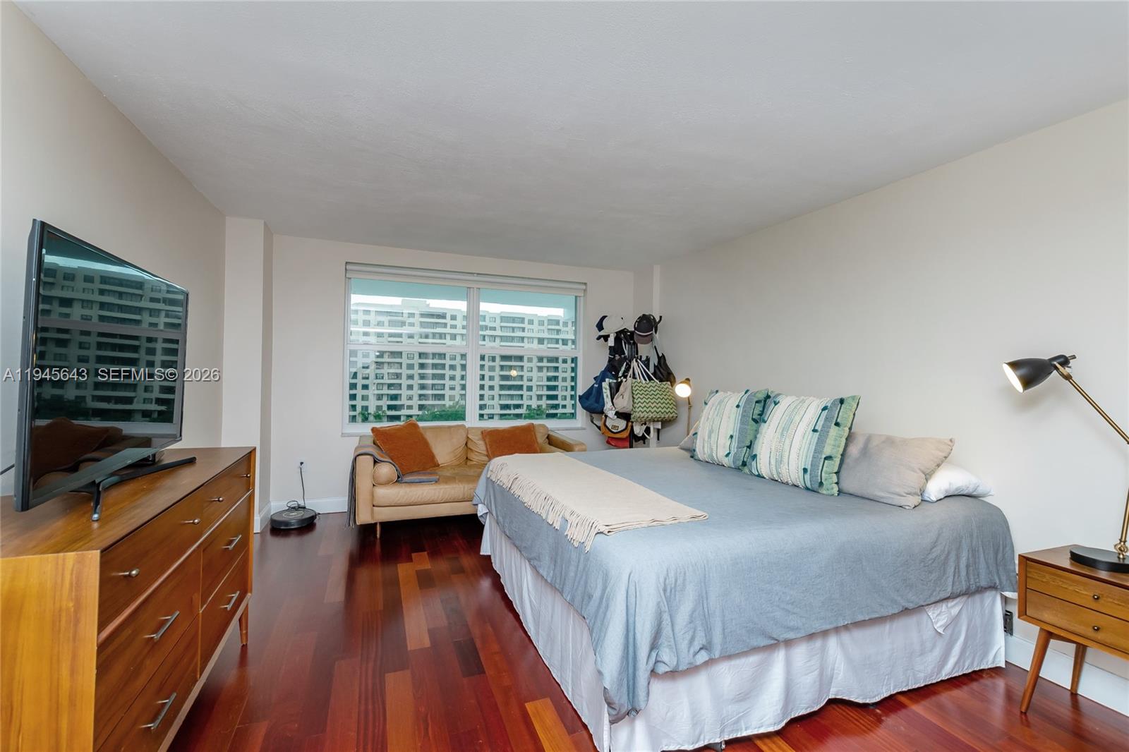 199 Ocean Ln Drive, Unit 807 Key Biscayne, FL 33149 - Photo 17 of 34 a bedroom with a bed and a window