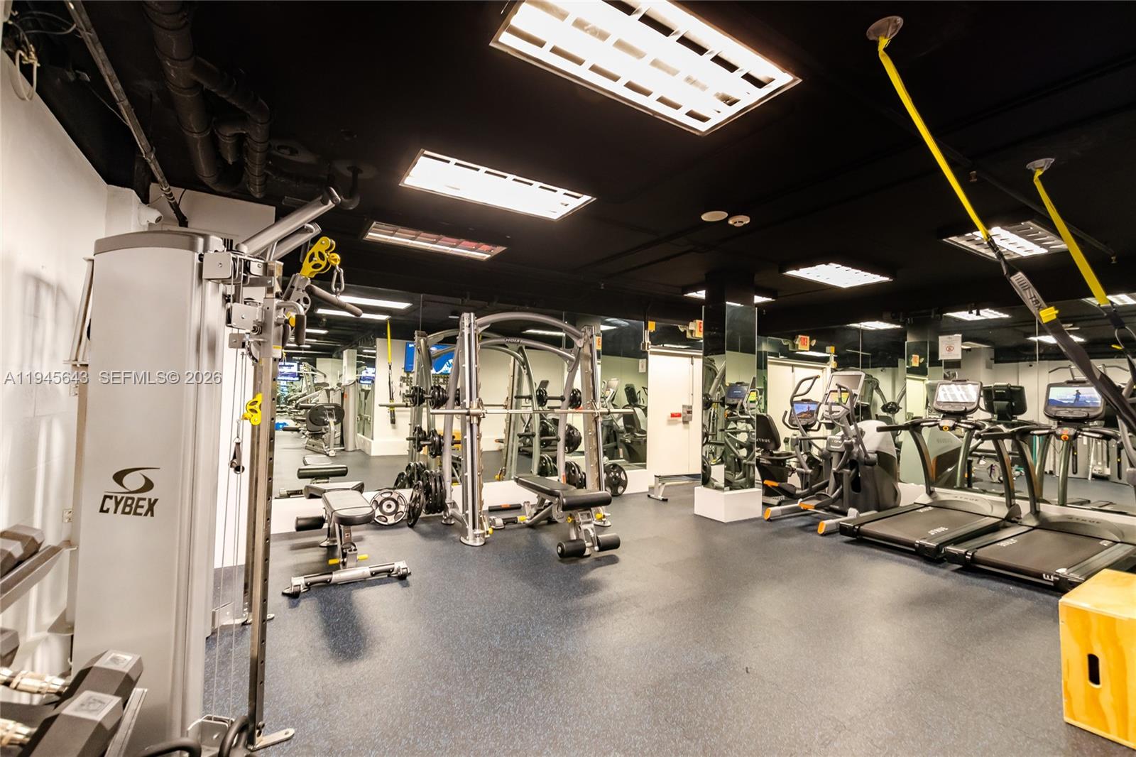 199 Ocean Ln Drive, Unit 807 Key Biscayne, FL 33149 - Photo 28 of 34 a view of a room with gym equipment