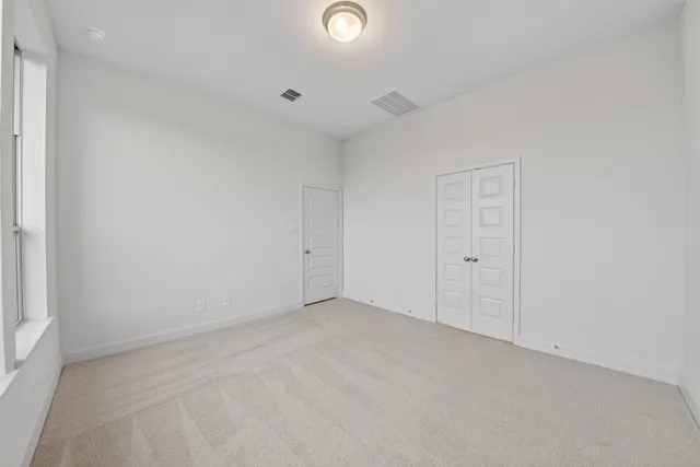 a bathroom with a double vanity sink mirror and double