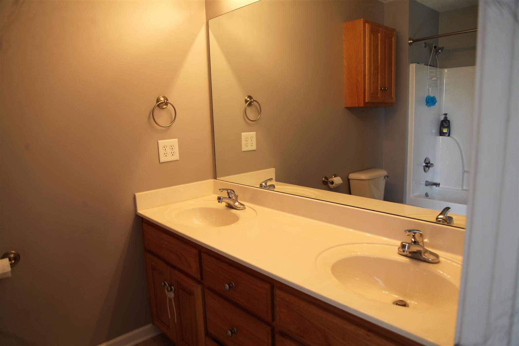 127 Old Martin Chapel Road Portland, TN 37148 - Photo 11 of 15 a bathroom with a sink and a mirror