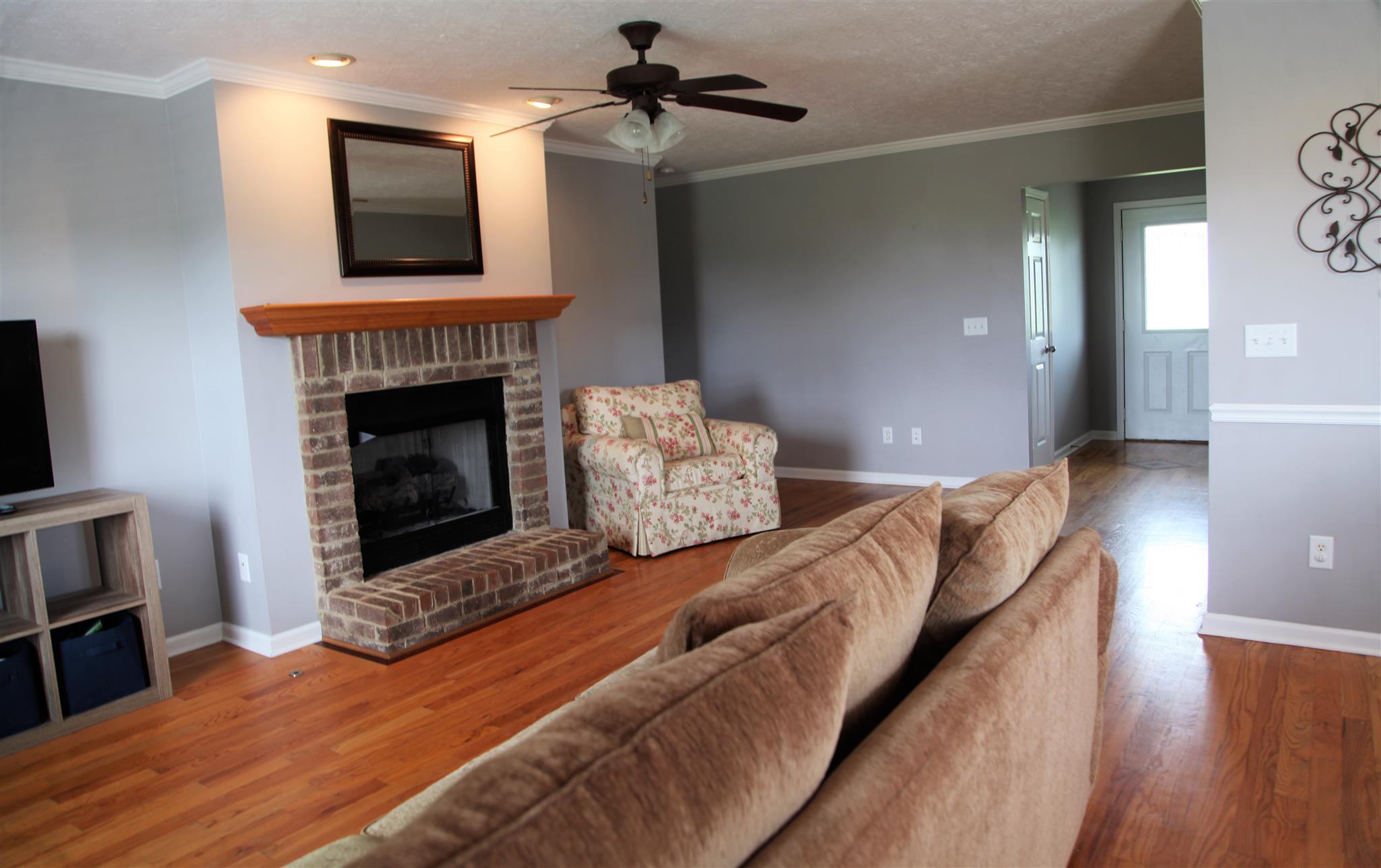 127 Old Martin Chapel Road Portland, TN 37148 - Photo 7 of 15 a living room with furniture and a fireplace