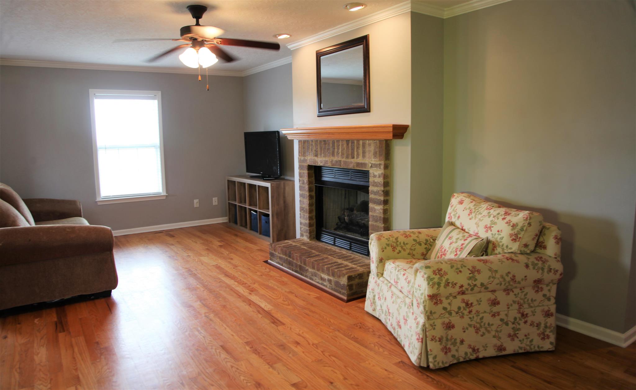127 Old Martin Chapel Road Portland, TN 37148 - Photo 8 of 15 a living room with furniture and a fireplace