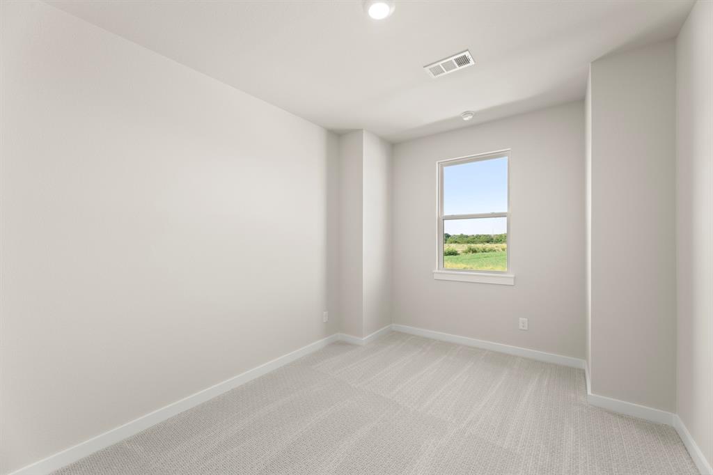 2001 Aldrich Road Celina, TX 75009 - Photo 24 of 37 an empty room with windows