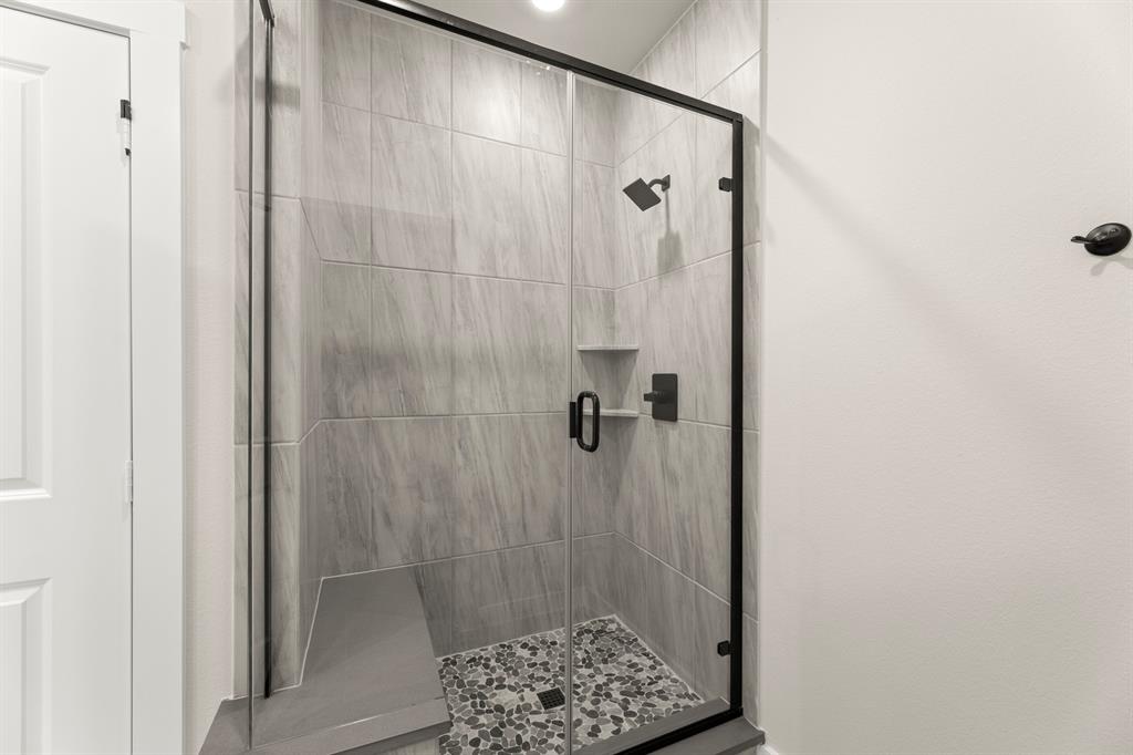 2001 Aldrich Road Celina, TX 75009 - Photo 32 of 37 a bathroom with a shower